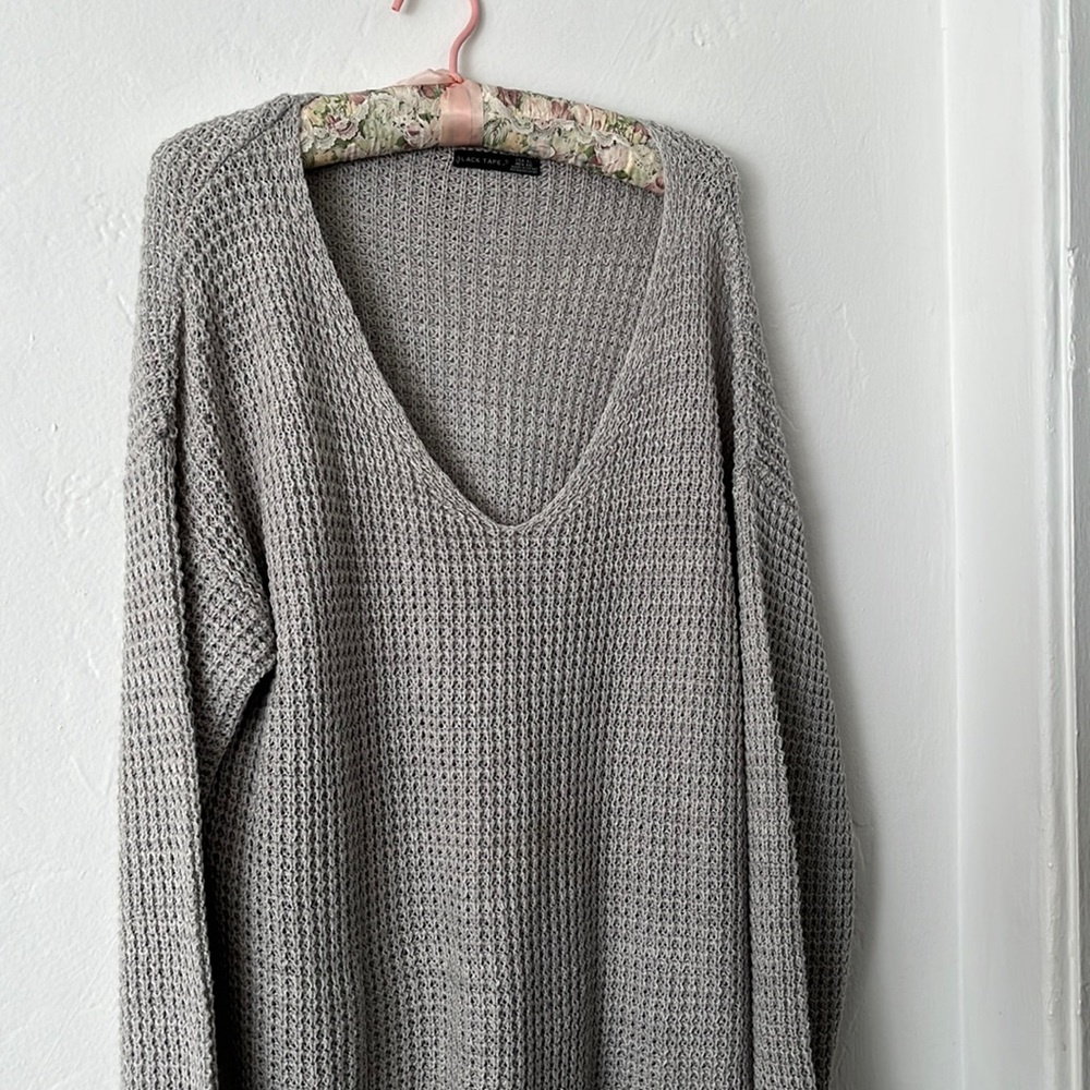 Light gray long sleeve sweater with v neck. Bought at boutique. Very soft!